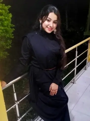 Confident Noida City Centre Call Girl standing